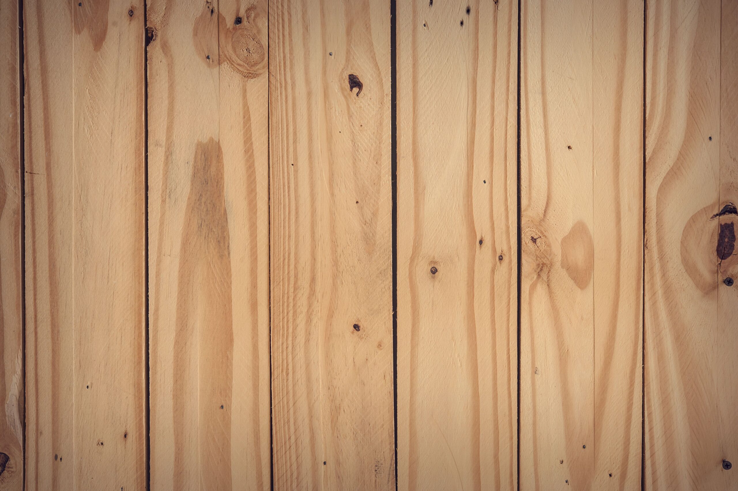 Natural hardwood planks with rustic texture perfect for backgrounds and designs.